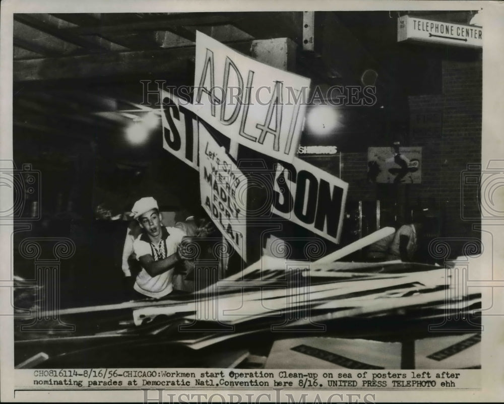 1956 Press Photo Workmen Start Clean-Up on Sea of Posters After Democrat Parades