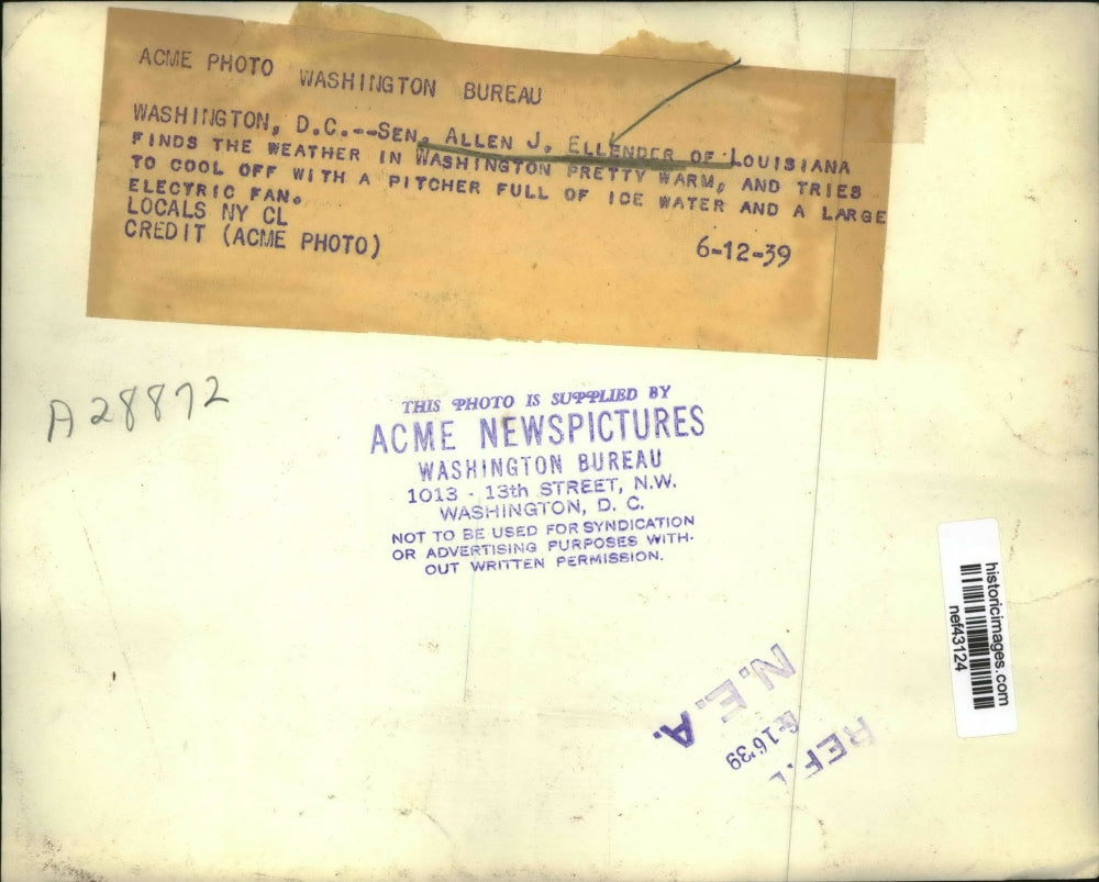 1939 Press Photo Sen Allen J Ellender Cools Off with Ice Water & Electric Fan