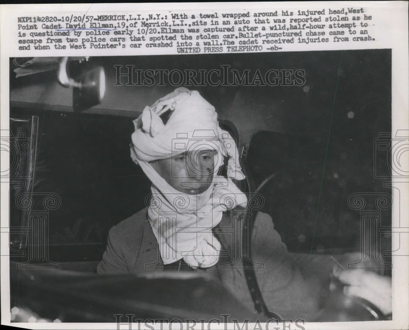 Load image into Gallery viewer, 1957 Press Photo David Ellman sits in an auto that was reported stolen
