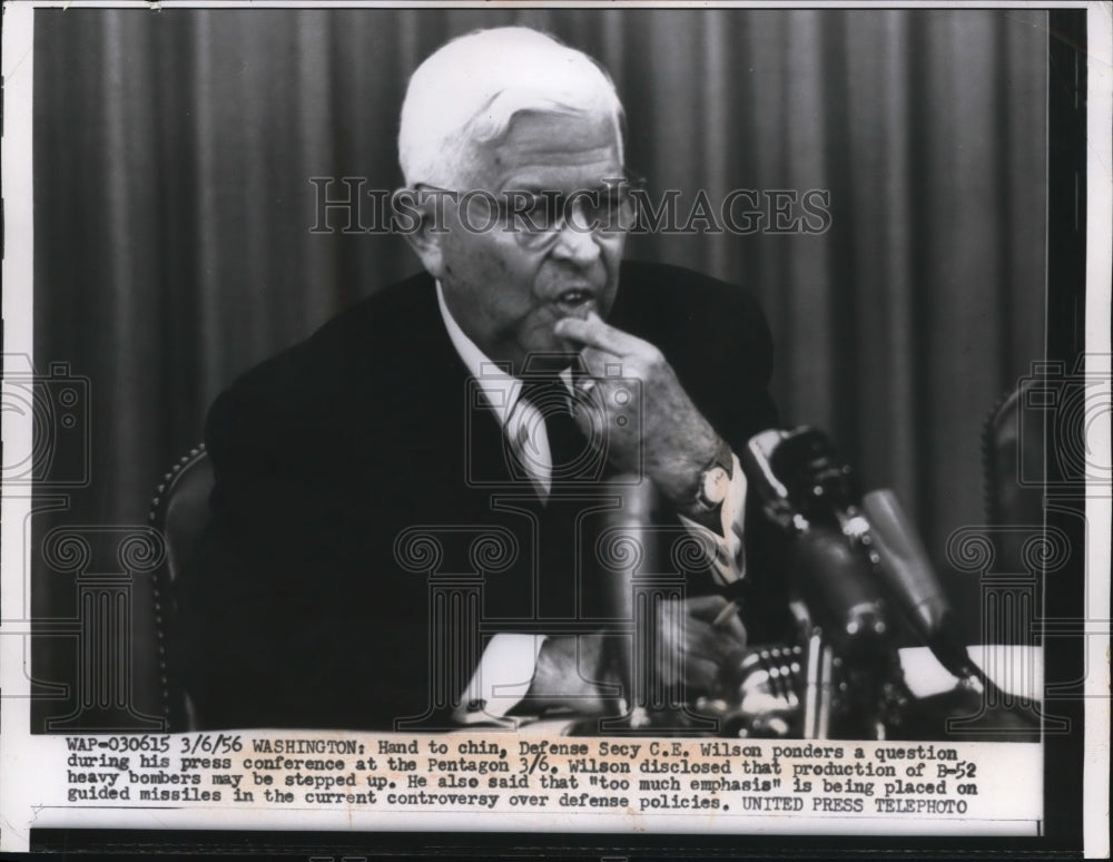 1956 Press Photo C.E Wilson Ponders Question During Press Conference at Pentagon