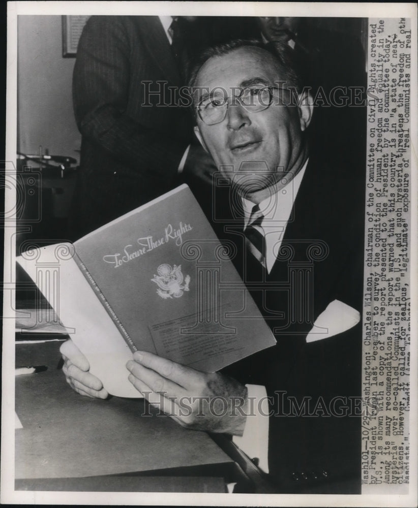 1947 Press Photo Charles Wilson Civil Rights Chairman w/ Human Freedom Report