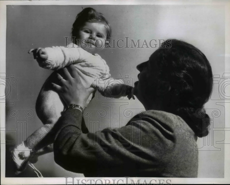 Load image into Gallery viewer, 1955 Press Photo Baby Amal Dijani in Washington after Blood Diease Treatment
