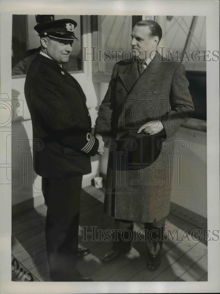 Load image into Gallery viewer, 1938 Press Photo Captain Anthony Dekema Congratulates Frans Bouman on NJ Arrival
