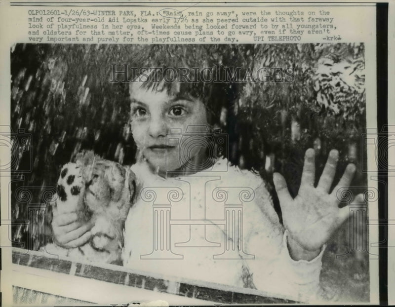 Load image into Gallery viewer, 1963 Press Photo Rain Go Away Were the Thoughts of 4 Year Old Adi Lopetka
