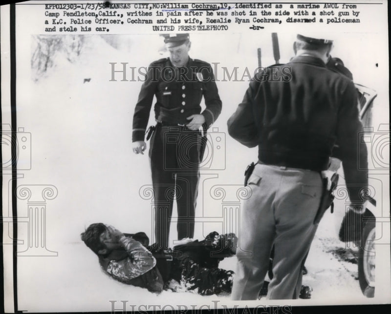 Load image into Gallery viewer, 1958 Press Photo William Cochran writhes in pain after being shot in the side
