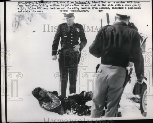 1958 Press Photo William Cochran writhes in pain after being shot in the side
