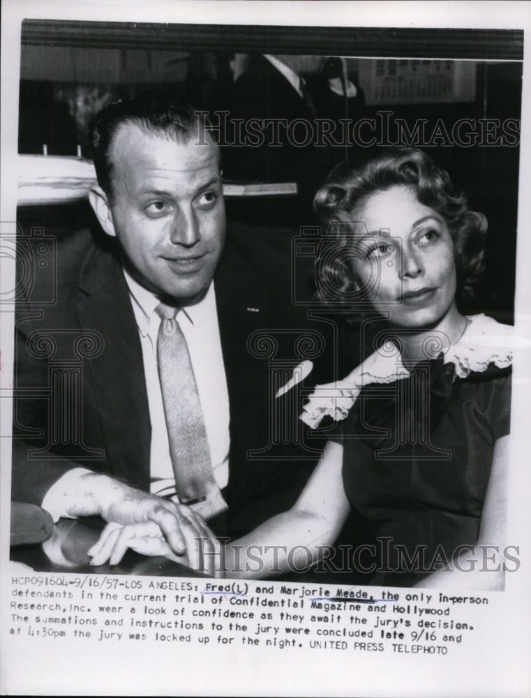 Load image into Gallery viewer, 1957 Press Photo Fred and Marjorie Meade wear a look of confidence during trial
