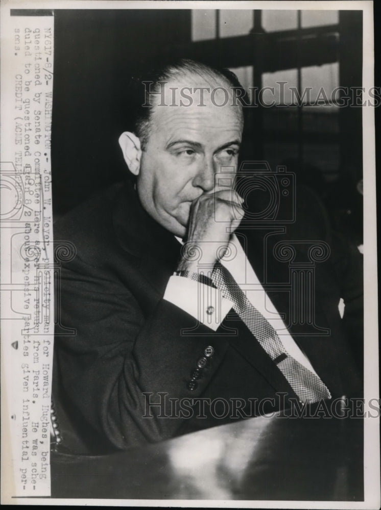 1947 Press Photo John Meyer publicity man for Howard Hughes being questioned