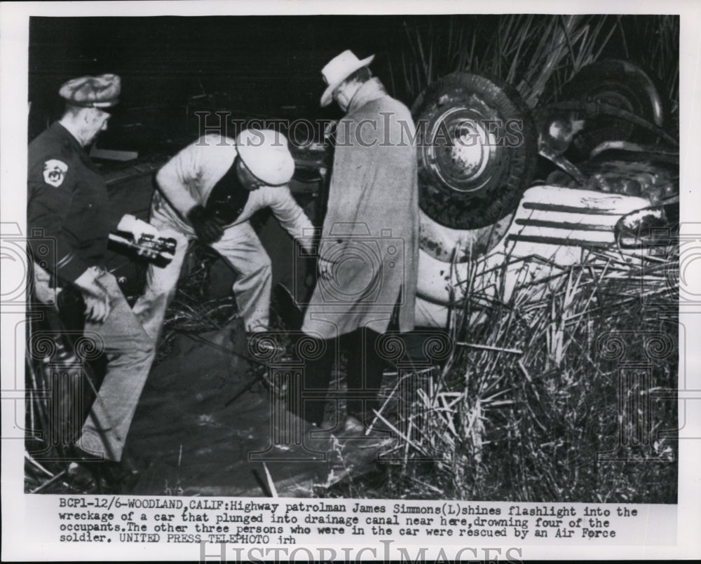 1954 Press Photo Police Inspecting Car Wreck in Drainage Canal, Woodland, CA