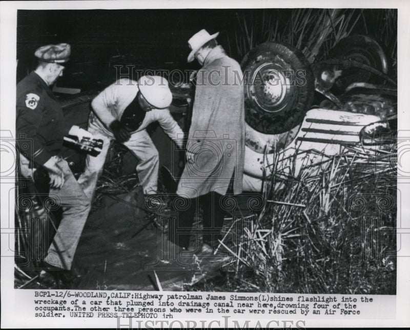 Load image into Gallery viewer, 1954 Press Photo Police Inspecting Car Wreck in Drainage Canal, Woodland, CA
