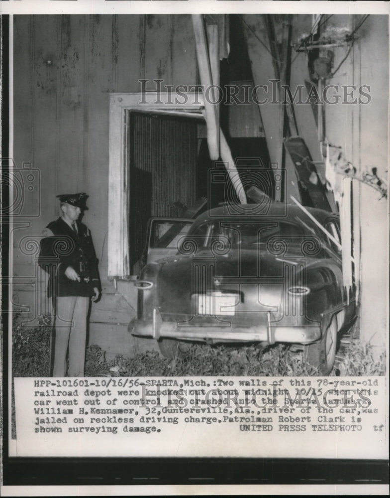 1956 Press Photo Car went out of control and crashed into Spatx Landmark