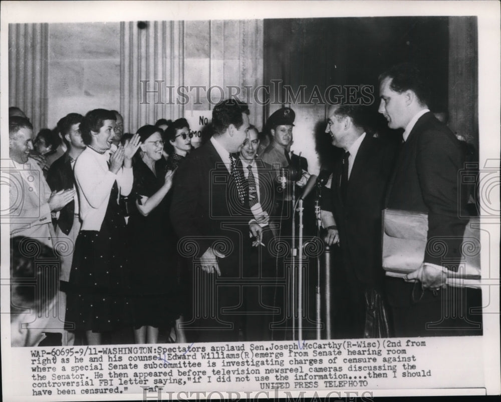 1954 Press Photo Spectators applaud Sen. Joseph McCarthy and his counsel