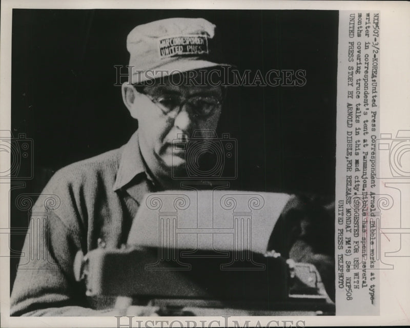 Load image into Gallery viewer, 1952 Press Photo Arnold Dibble UPI Correspondent work in a tent at Panmunjom
