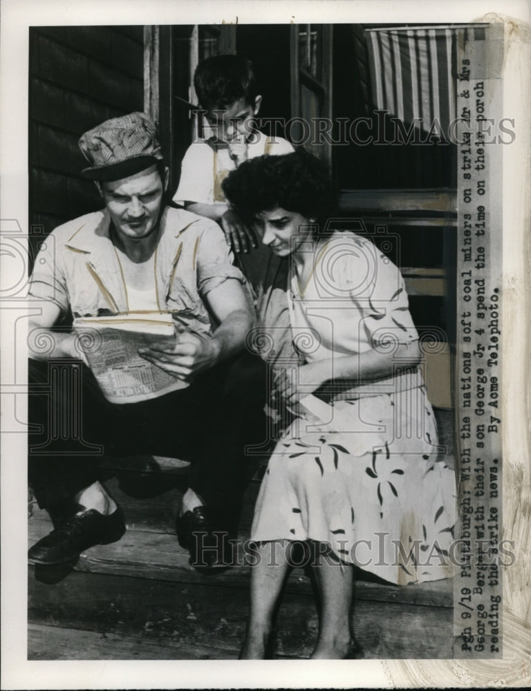 Load image into Gallery viewer, 1949 Press Photo Mr.&amp; Mrs.george Berger read news of Pittsburgh Coal Mine Strike
