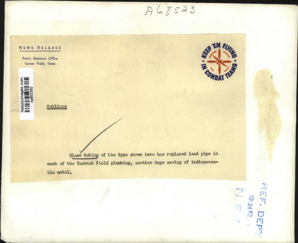 1942 Press Photo Glass Tubing has replaced Lead Pipe - nef50365