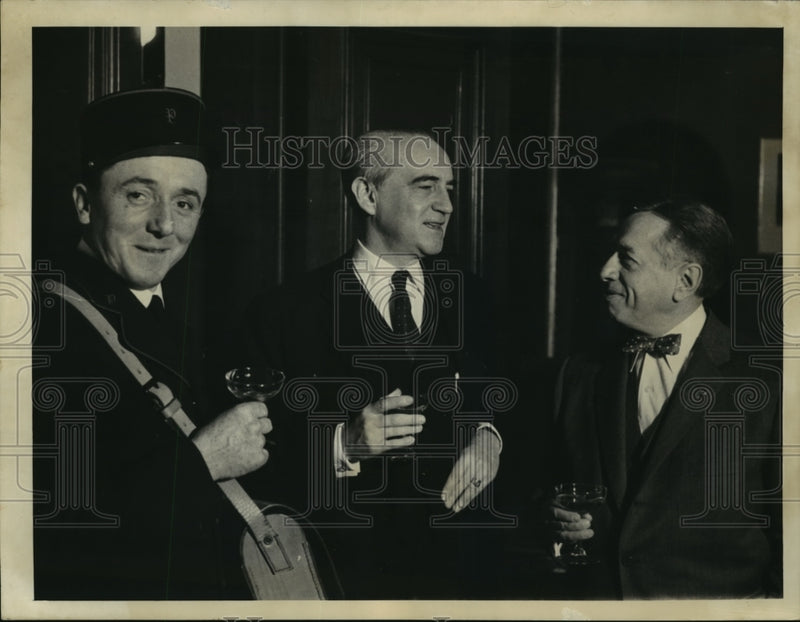 Load image into Gallery viewer, 1957 Press Photo Abel Charbonnier Shown Sipping Champagne During Reception
