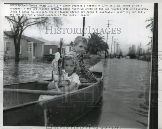 1958 Press Photo Children in Canoe After Flooding in Hawthorne, California