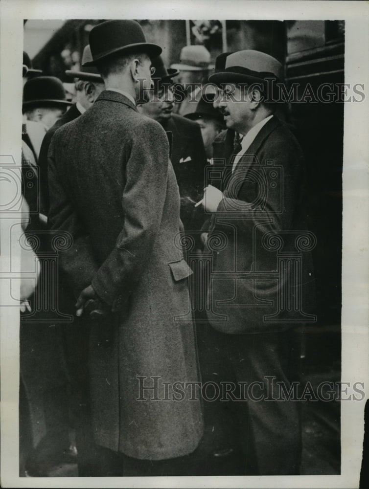 1935 Press Photo Premier Laval converses with Roger Laugeron, M. Camille Blaisot