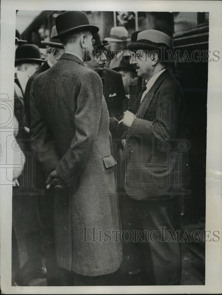 1935 Press Photo Premier Laval converses with Roger Laugeron, M. Camille Blaisot