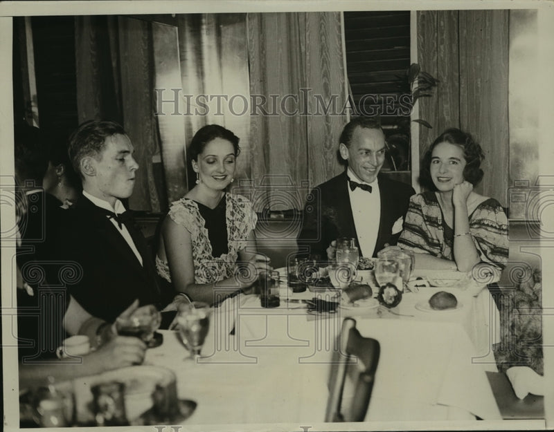 Load image into Gallery viewer, 1934 Press Photo Group Celebrating New Year's Eve at Marlborough House Club
