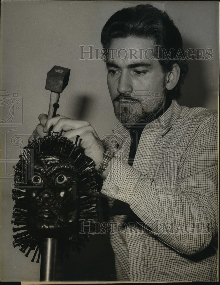 Load image into Gallery viewer, 1966 Press Photo Futuristic Gold mash Done in Inca Traditional Sculptor
