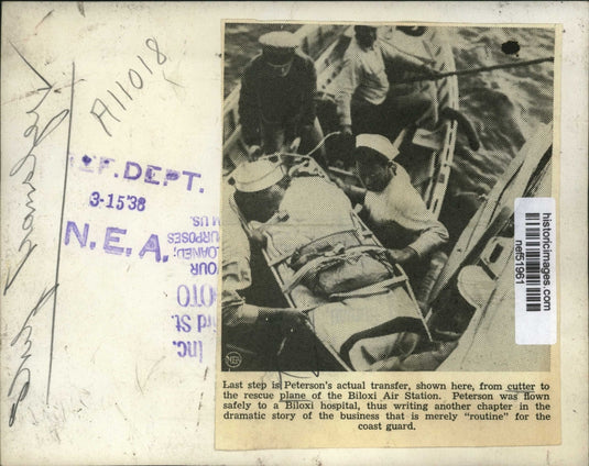 1938 Press Photo Peterson's Transfer From Cutter to Plane of Biloxi Air Station