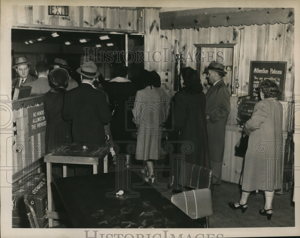 1951 Press Photo Unknown Female Files Police Report After Raid on Bingo Game