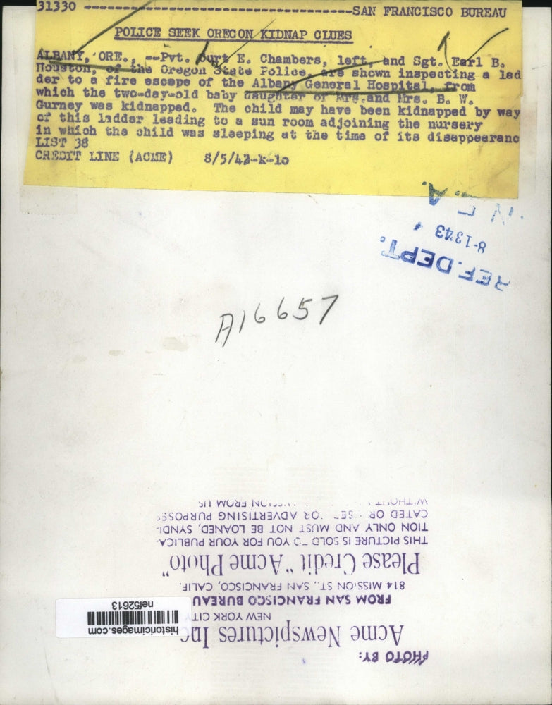 1942 Press Photo Burt E. Chambers, Earl B. Houston inspect a fire escape ladder