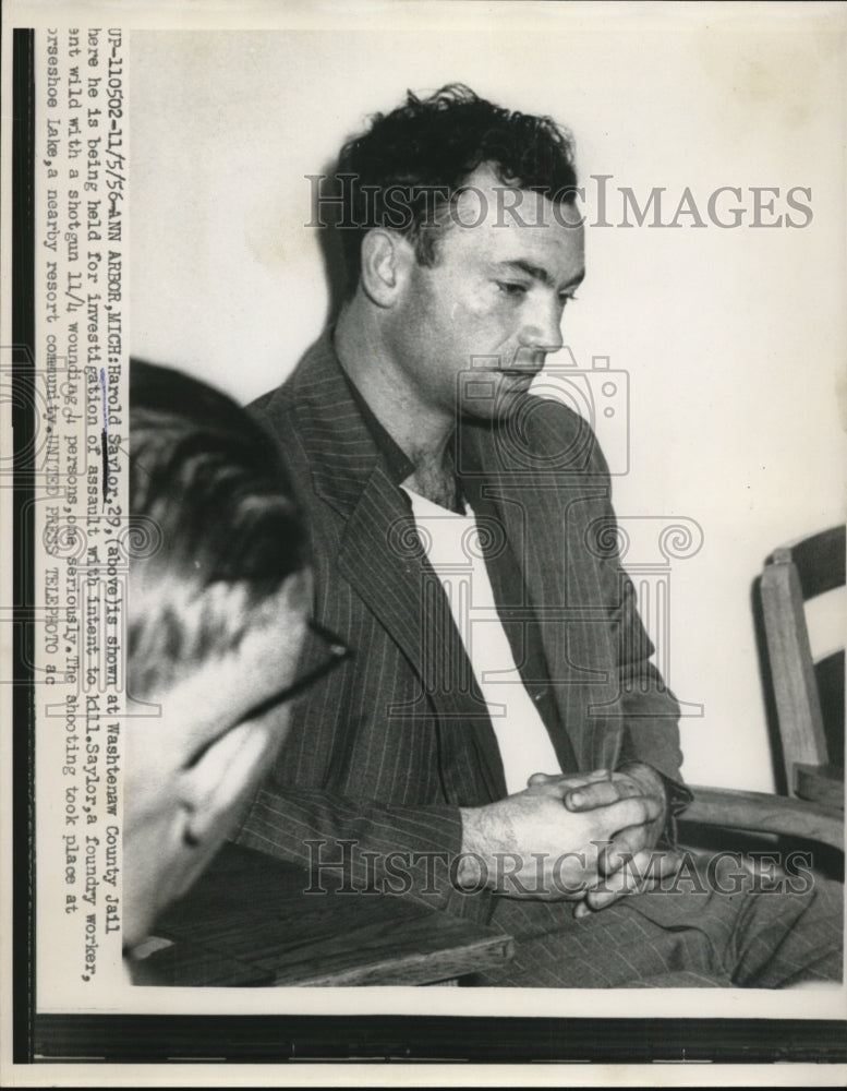 Load image into Gallery viewer, 1956 Press Photo Harold Saylor Held for Shooting at Horseshoe Lake, Michigan
