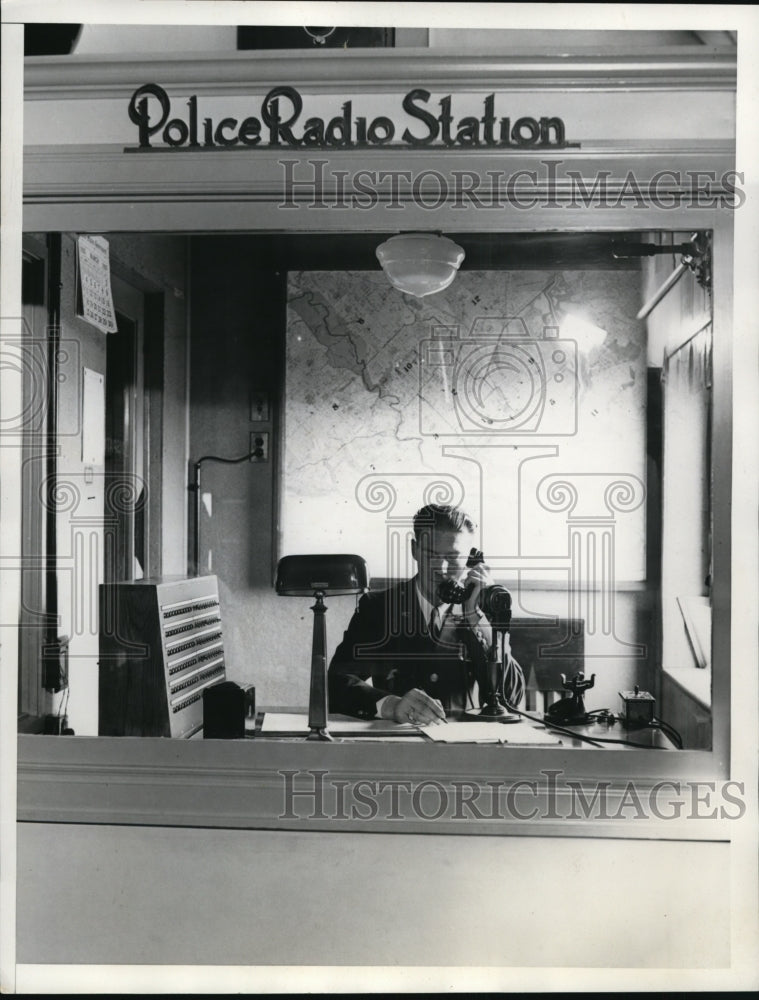 Load image into Gallery viewer, 1935 Press Photo D.C. Dispatcher Receiving Report in Sound Proof Casting Booth
