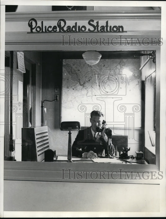 1935 Press Photo D.C. Dispatcher Receiving Report in Sound Proof Casting Booth