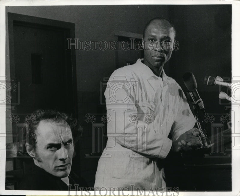 Load image into Gallery viewer, 1971 Press Photo Frank Lott Listens to Question From Newsman During Interview
