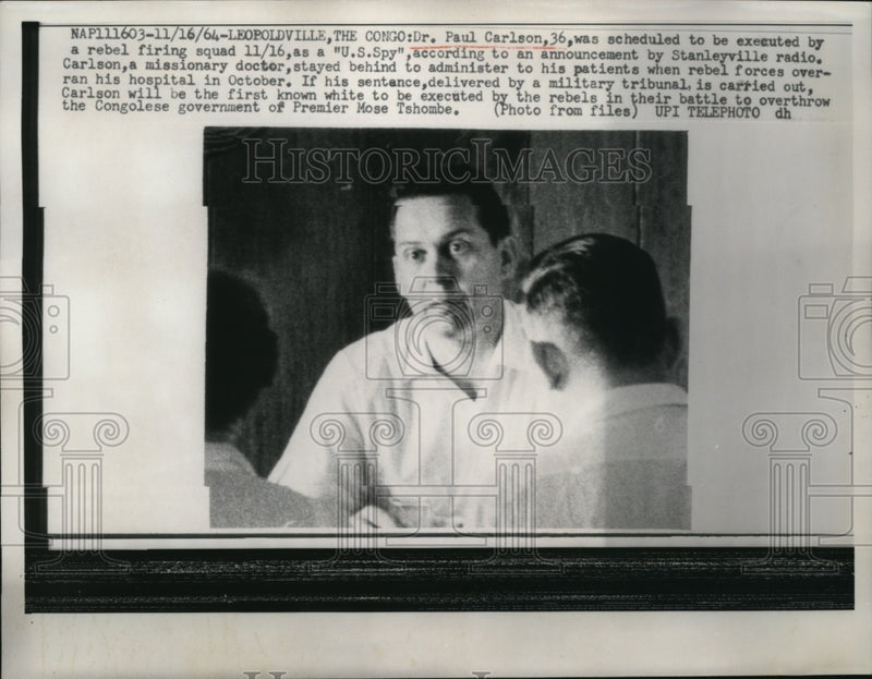 Load image into Gallery viewer, 1964 Press Photo Dr Paul Carlson Scheduled to be Executed by Rebel Firing 11/16
