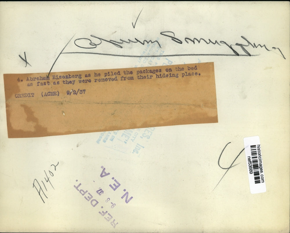 1937 Press Photo Abraham Eisenberg Piled Packages as Fast as They Were Removed