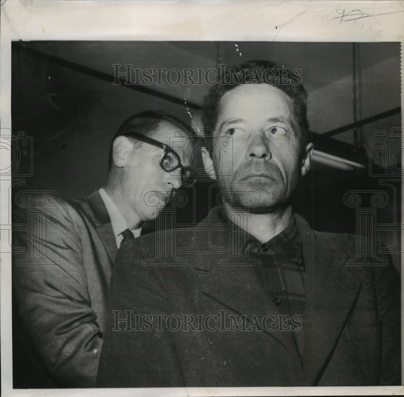Load image into Gallery viewer, 1959 Press Photo Rodney Austin Stares into space while being securely strapped
