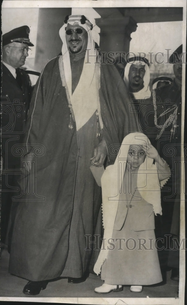 Load image into Gallery viewer, 1957 Press Photo Little Prince Mashhur holds the hand of his father - nef56186
