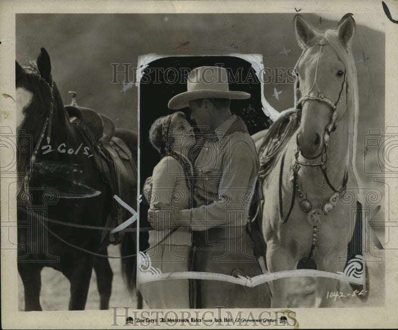 Load image into Gallery viewer, 1927 Press Photo Actor Jack Holt, Betty Jewel in "The Mysterious Rider"
