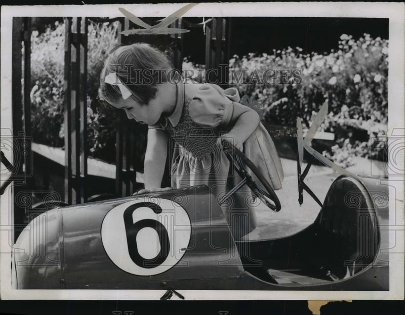 Load image into Gallery viewer, 1952 Press Photo Princess Marijke Takes Serious Look at Her Little Automobile
