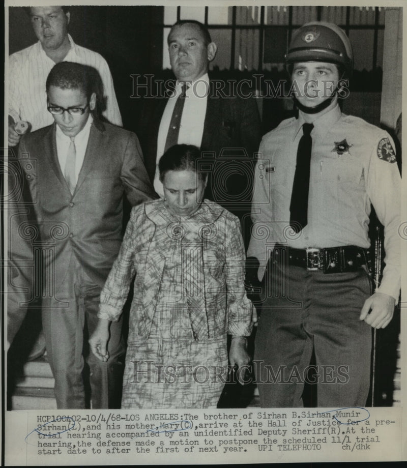 Load image into Gallery viewer, 1968 Press Photo Munir Sirhan, mother Mary arrive at the Hall of Justice
