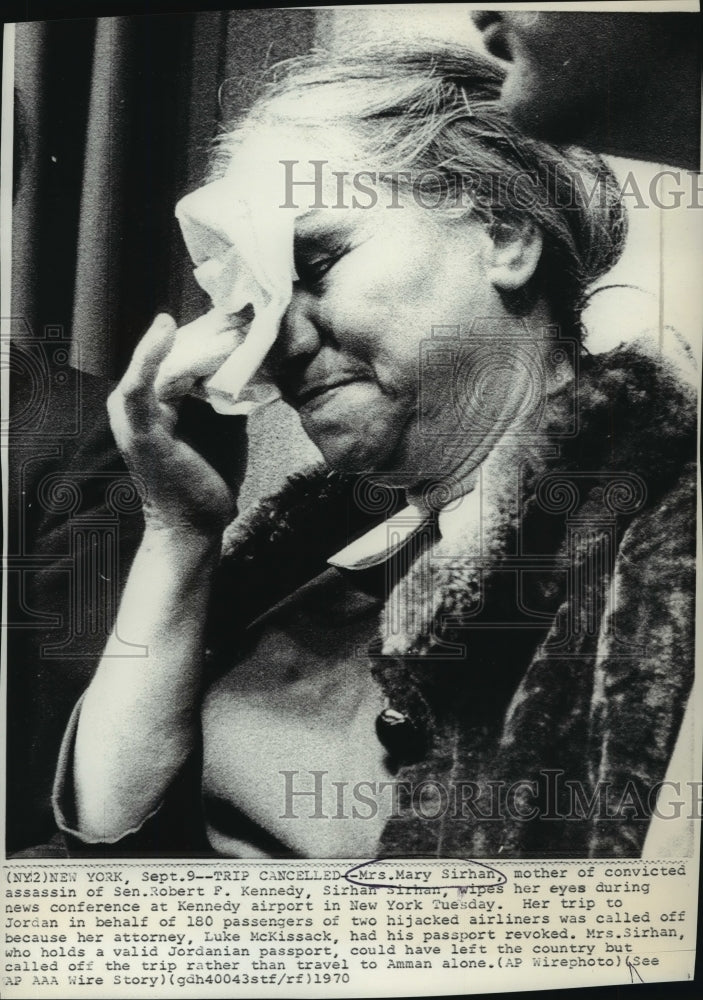 Load image into Gallery viewer, 1970 Press Photo Mary Sirhan wipes her eyes during news conference - nef58908
