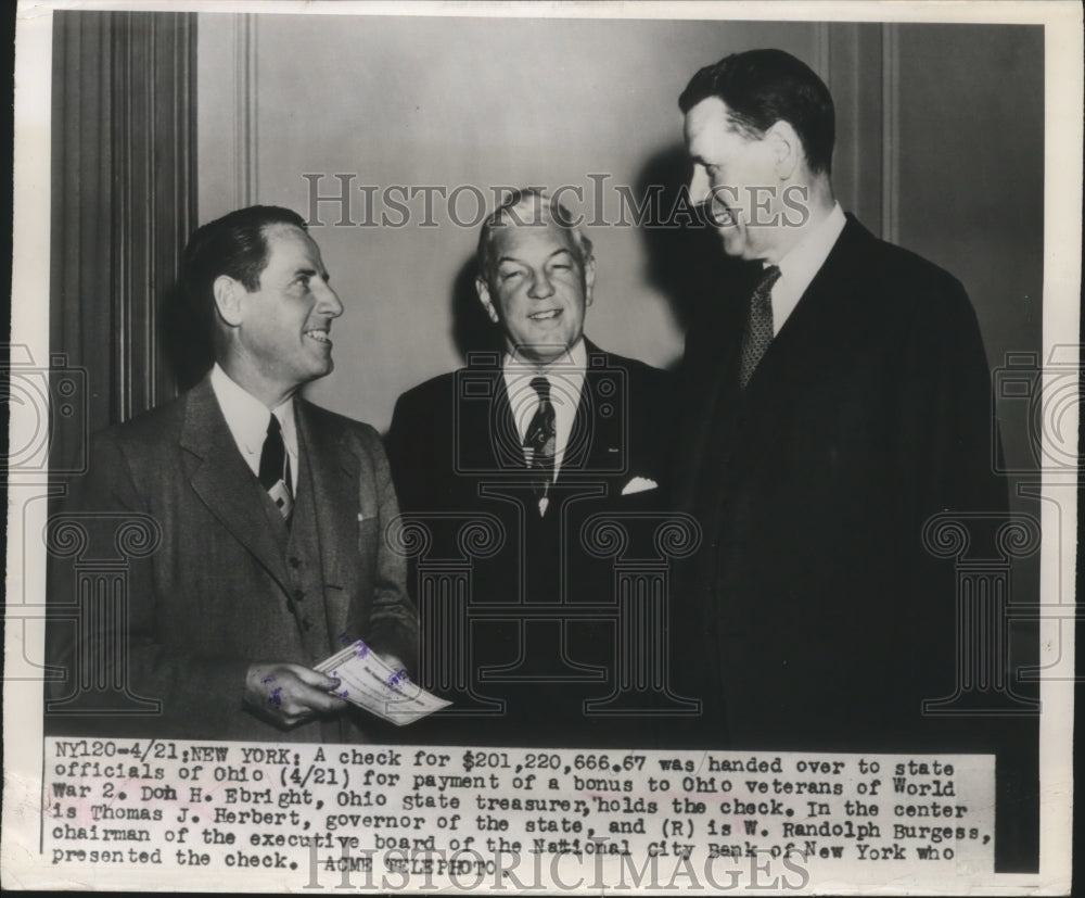 1948 Press Photo Don H. Ebright holds check for $201,220,666.67 - nef59073