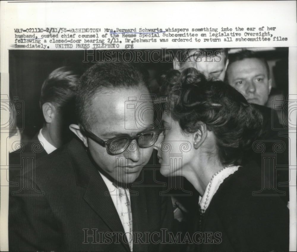 1958 Press Photo Mrs.Bernard Schwartz whispered to her husband, chief counsel