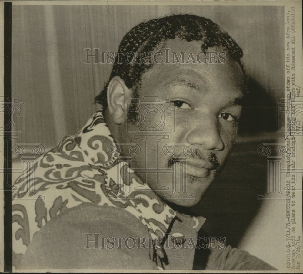 1974 Press Photo George Foreman, Heavyweight Champion shows his Afro Look