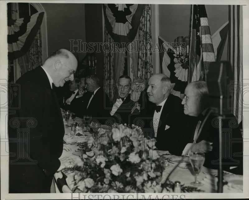 Load image into Gallery viewer, 1938 Press Photo James A. Farley, John Trump speaking over banquet table
