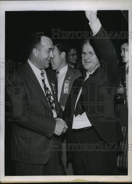 1944 Press Photo Harold L. Ickes receives handshake of R.J. Thomas - nef61001