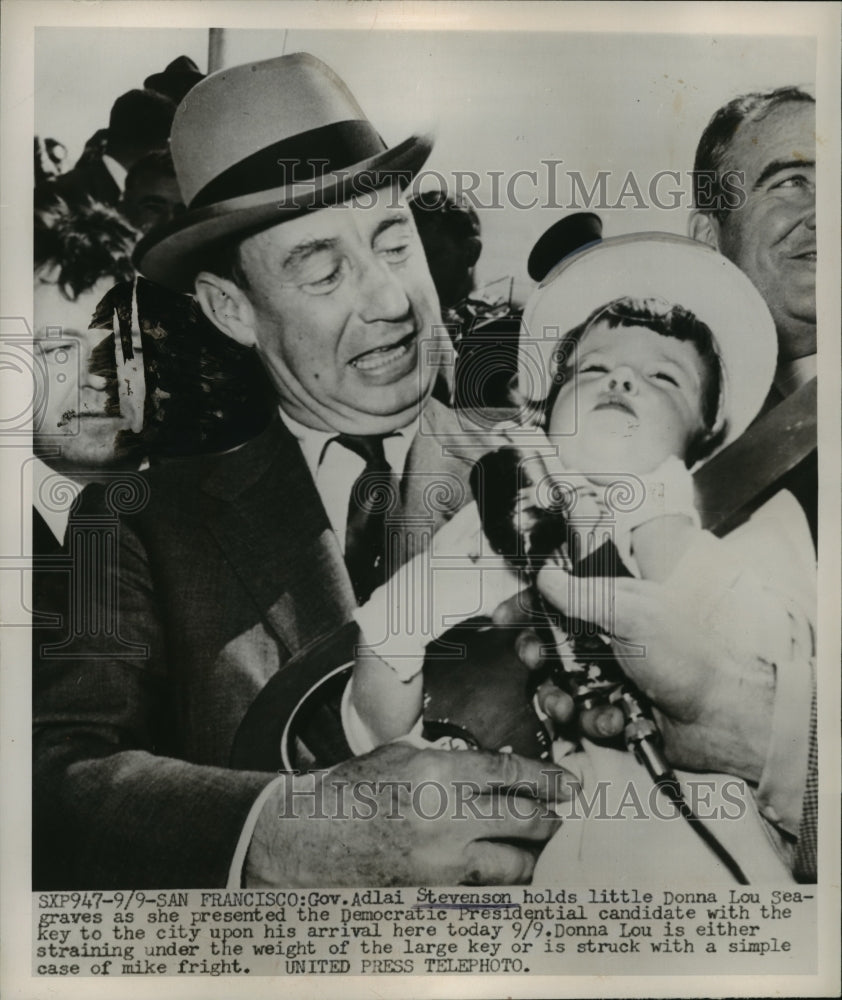 1952 Press Photo Gov.Adlai Stevenson holds little Donna Lou Seagraves