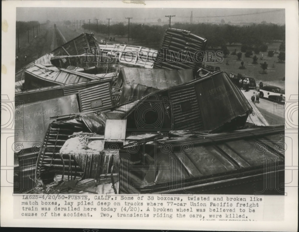 1950 Press Photo Union Pacific Freight Train Boxcars Derailed, Puente, CA- Historic Images