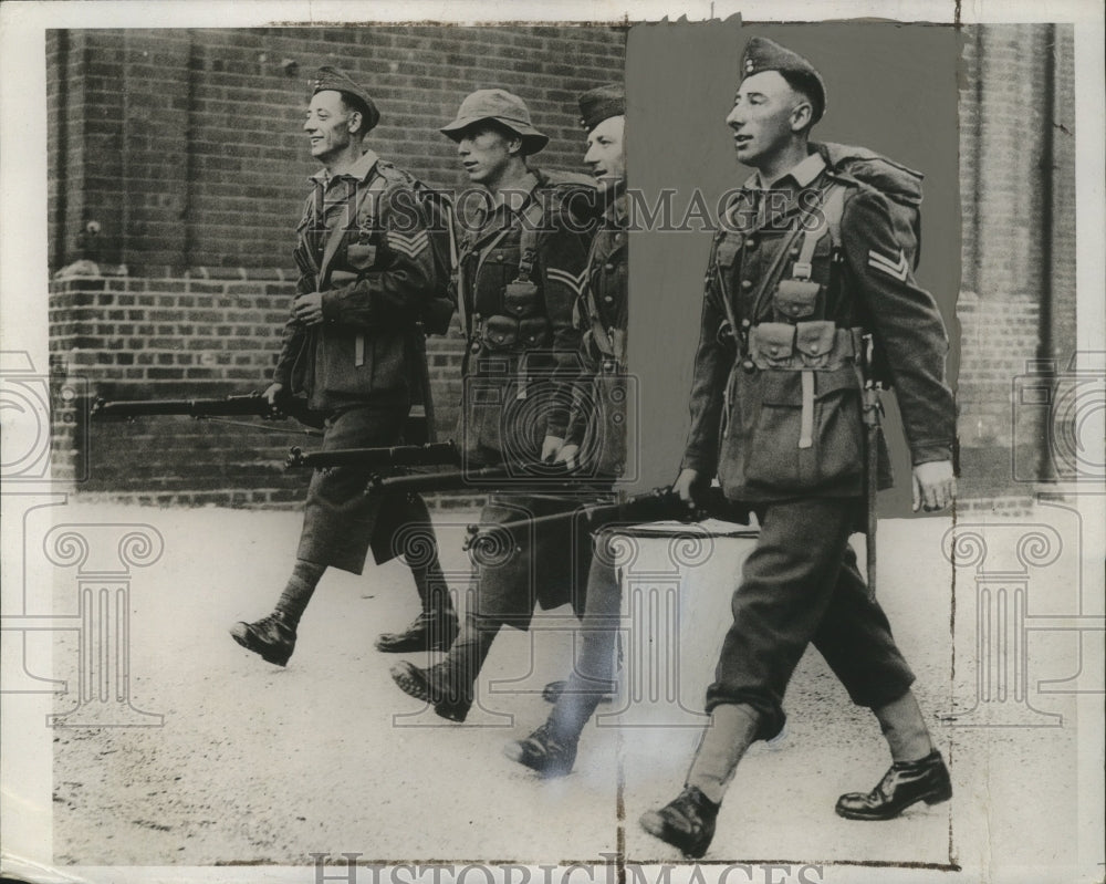 1934 Press Photo Men of the regiment marching to the maneuvers - nef62388- Historic Images