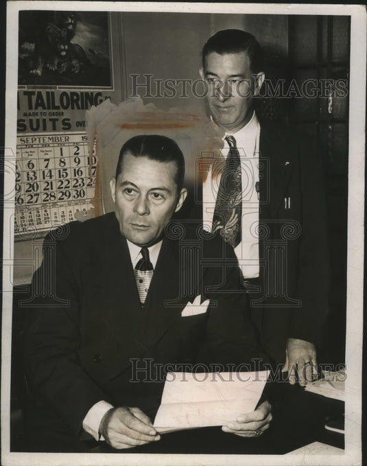 1949 Press Photo Michael Blackwell and John Fitzgerald at desk - nef62440- Historic Images