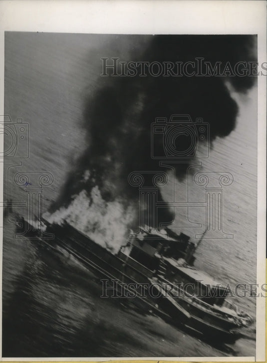 1945 Press Photo Japanese Ablaze & Slowly Beginning to Sink After U.S. Raid